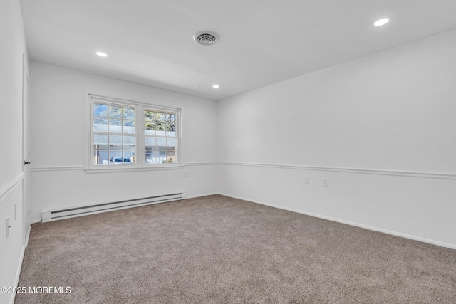 empty room featuring baseboards, visible vents, a baseboard radiator, recessed lighting, and carpet flooring