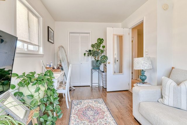 entryway with wood finished floors