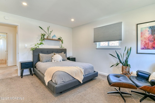 bedroom with recessed lighting, light colored carpet, and baseboards