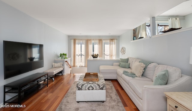 living room with wood finished floors