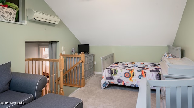 bedroom featuring a wall mounted air conditioner, vaulted ceiling, and carpet flooring