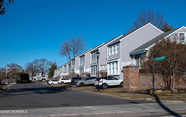 view of road with a residential view