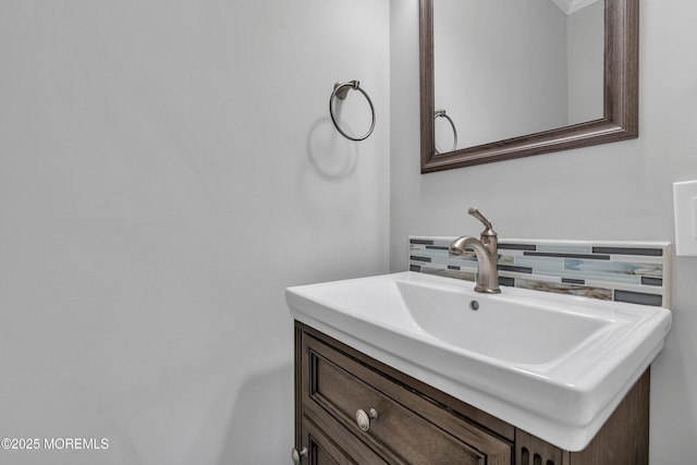 bathroom with backsplash and vanity