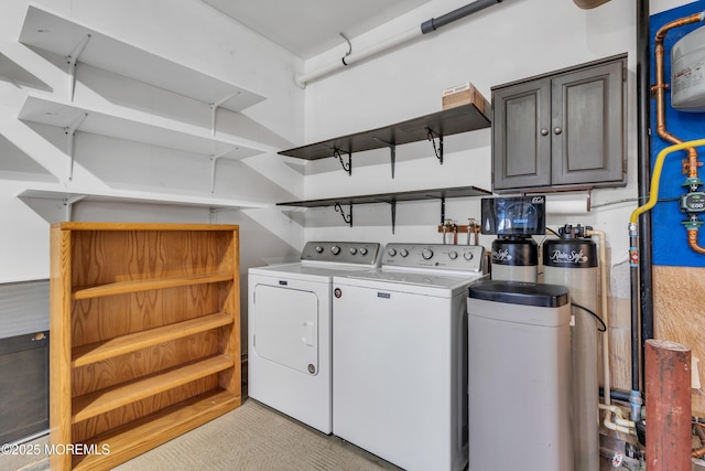 laundry area featuring laundry area and washer and clothes dryer