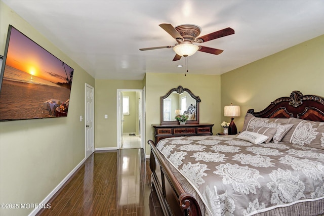 bedroom featuring ceiling fan, baseboards, and dark wood finished floors