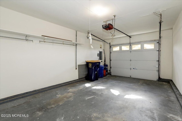 garage featuring a garage door opener