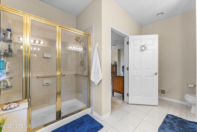 full bathroom with baseboards, visible vents, toilet, tile patterned flooring, and a shower stall