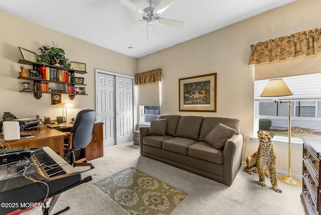 office featuring carpet and ceiling fan