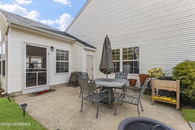 view of patio featuring outdoor dining space