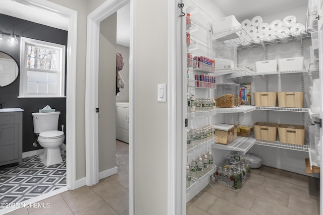 storage area featuring washer / dryer