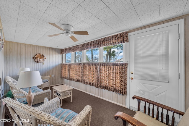 sunroom / solarium with ceiling fan