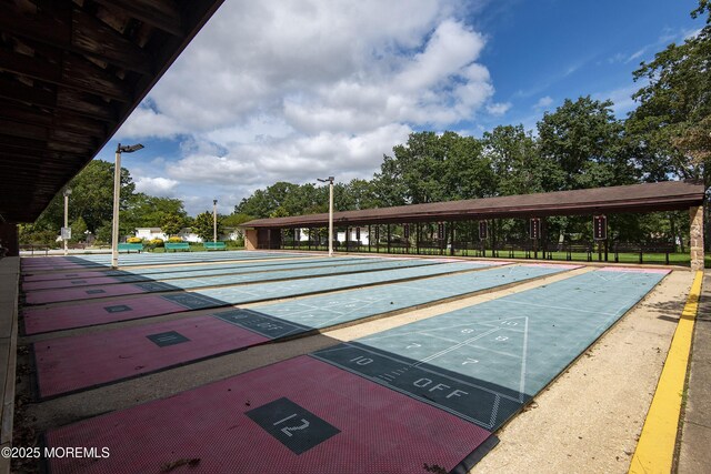 view of community featuring shuffleboard