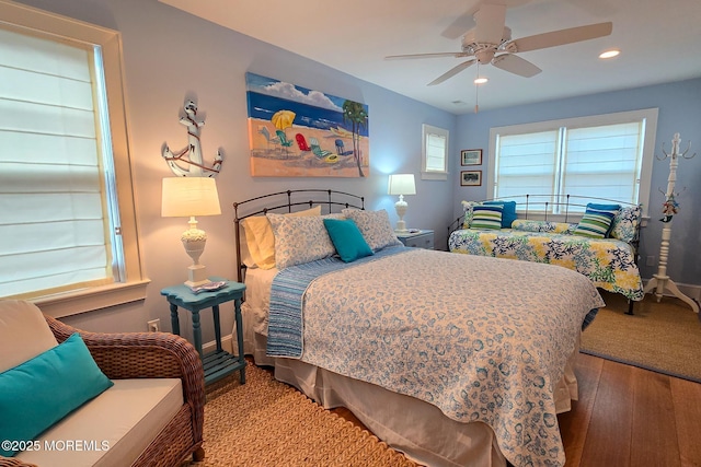 bedroom with a ceiling fan, recessed lighting, and wood-type flooring