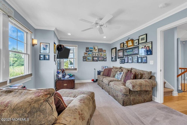 living area with ornamental molding, recessed lighting, baseboards, ceiling fan, and stairs