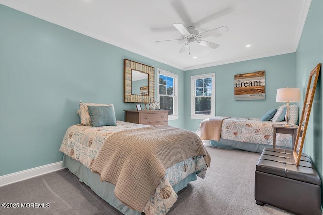 bedroom with a ceiling fan, crown molding, carpet, and baseboards