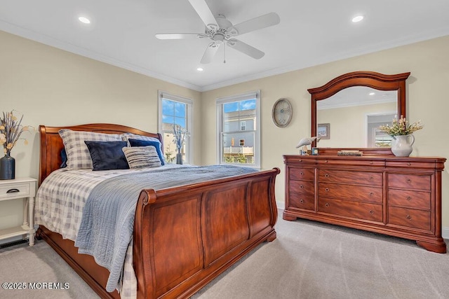 bedroom featuring a ceiling fan, crown molding, recessed lighting, and light colored carpet