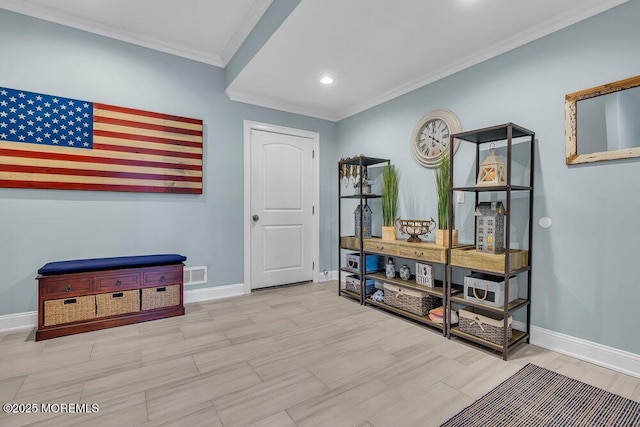 interior space with baseboards, visible vents, wood tiled floor, recessed lighting, and ornamental molding