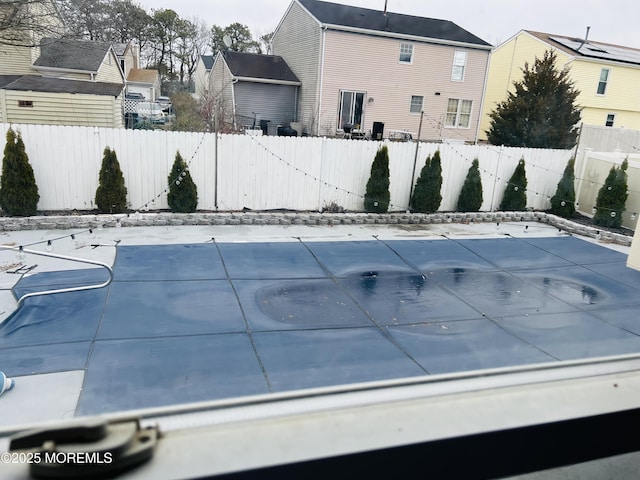 view of pool featuring a fenced in pool and a fenced backyard