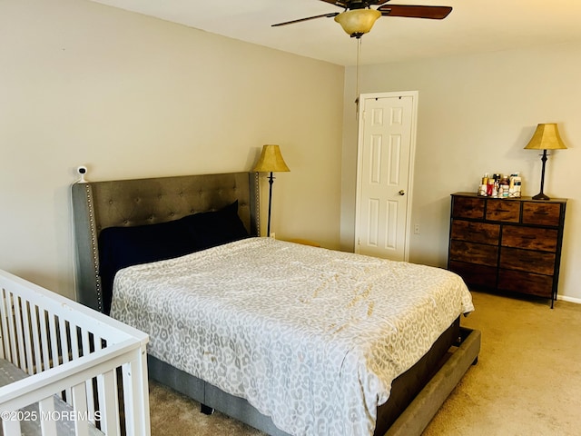 bedroom with carpet flooring and a ceiling fan