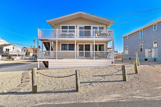 view of front of property featuring stairs