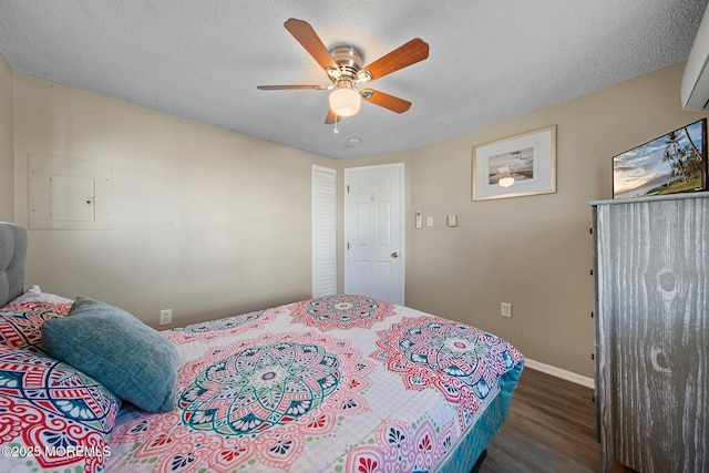 5909 Ocean Blvd, Long Beach Twp, NJ 08008 - bedroom featuring baseboards, a textured ceiling, wood finished floors, and a ceiling fan