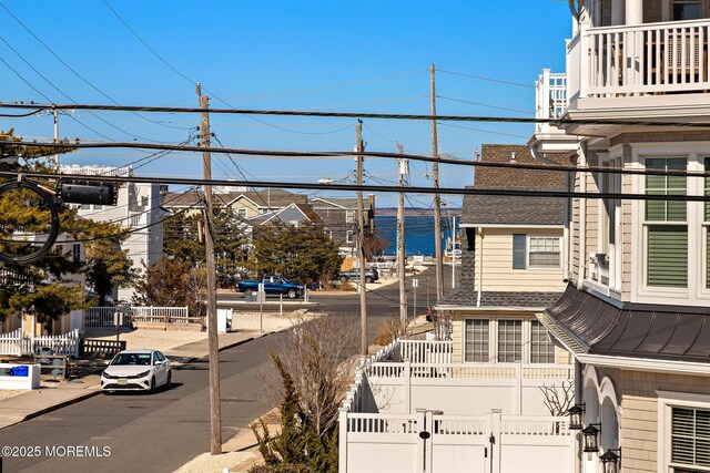 5909 Ocean Blvd, Long Beach Twp, NJ 08008 - exterior space with a fenced front yard and a gate