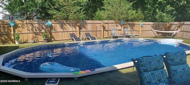 view of pool with fence private yard and a fenced in pool