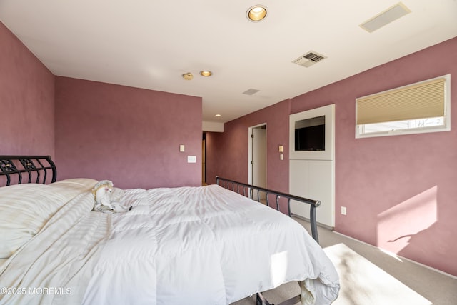 carpeted bedroom featuring visible vents and recessed lighting