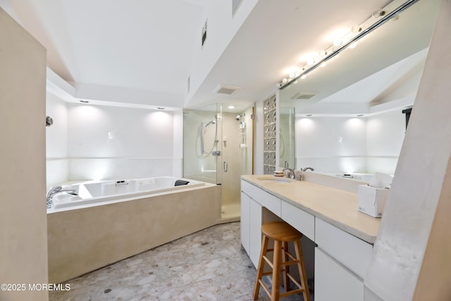 bathroom with visible vents, lofted ceiling, a garden tub, vanity, and a shower stall