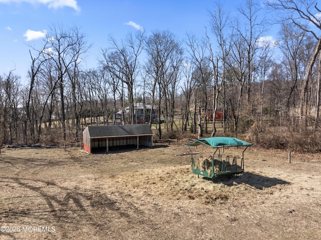 surrounding community featuring an outbuilding