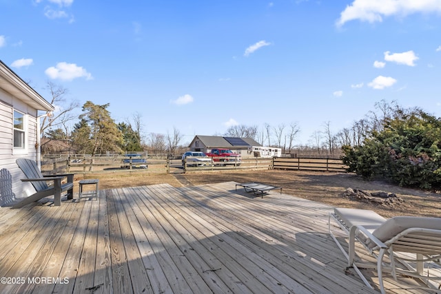 wooden deck featuring fence