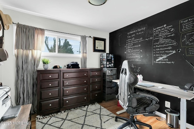 office space with wood finished floors