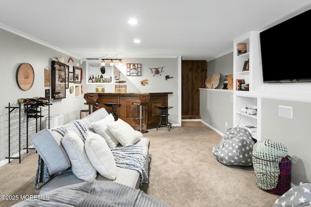 living room with recessed lighting, a bar, ornamental molding, and carpet flooring