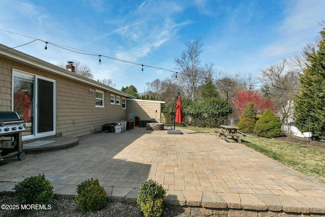 view of patio with a grill