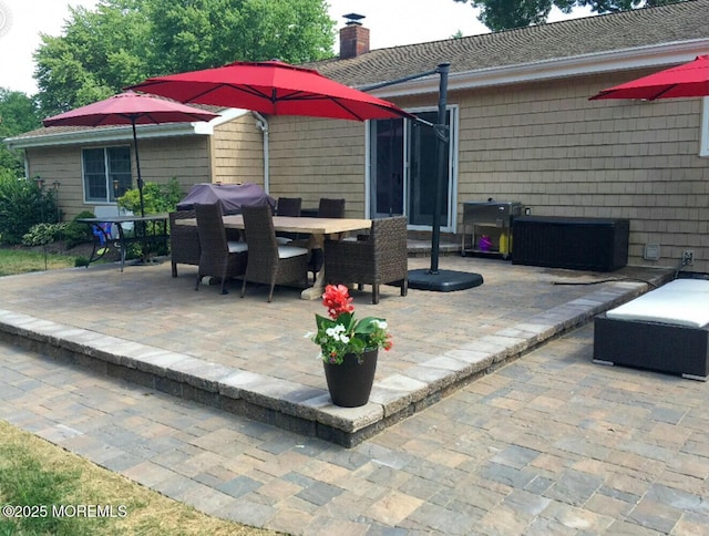 view of patio with outdoor dining space