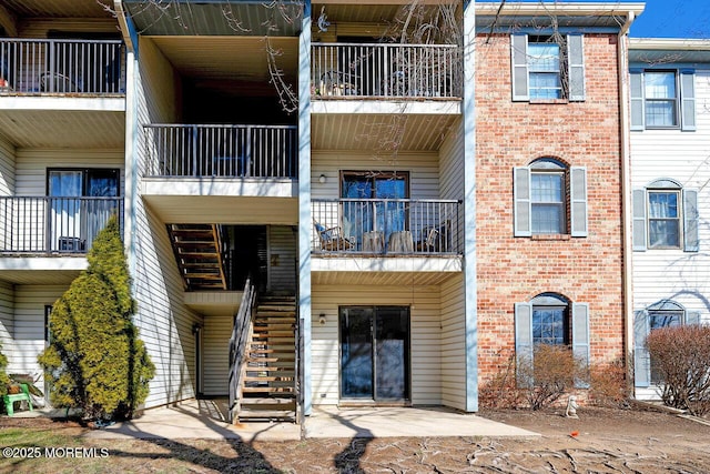 view of building exterior with stairs