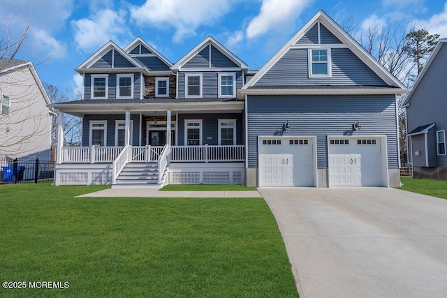 view of front facade featuring a porch, concrete driveway, and a front lawn