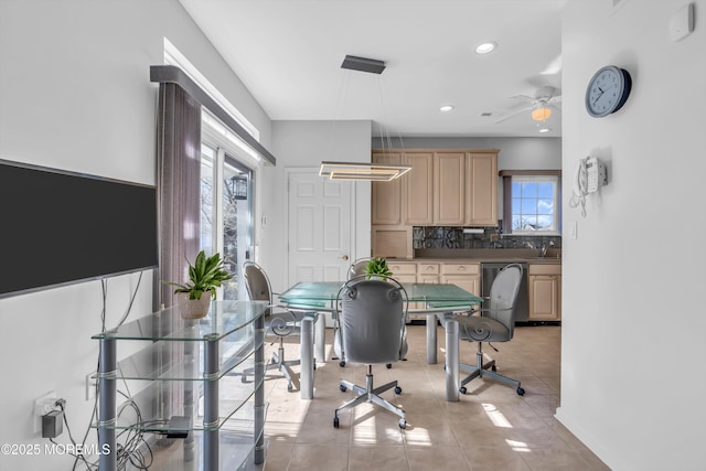 interior space with a ceiling fan, recessed lighting, baseboards, and light tile patterned floors