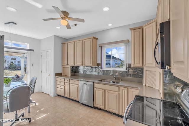 kitchen with tasteful backsplash, appliances with stainless steel finishes, light brown cabinets, a sink, and recessed lighting