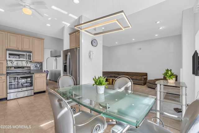 dining area featuring ceiling fan, light tile patterned flooring, and recessed lighting