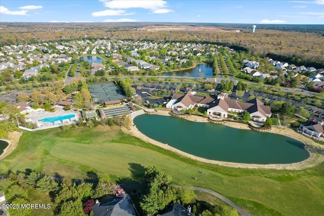 bird's eye view with a residential view and a water view