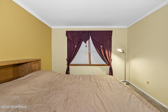 unfurnished bedroom featuring ornamental molding and baseboards