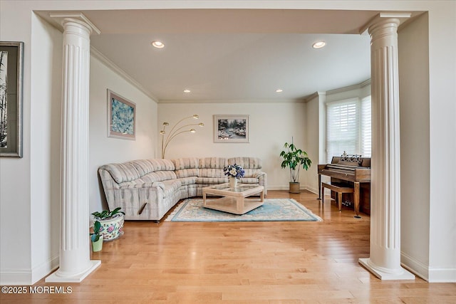 1 Christie Ln, Freehold, NJ 07728 - living area with ornate columns, ornamental molding, light wood-type flooring, and recessed lighting