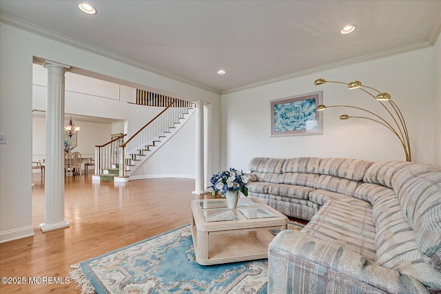 1 Christie Ln, Freehold, NJ 07728 - living room featuring decorative columns, wood finished floors, stairs, crown molding, and recessed lighting