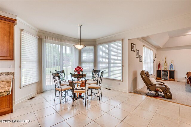 1 Christie Ln, Freehold, NJ 07728 - dining area featuring healthy amount of natural light, ornamental molding, and light tile patterned floors