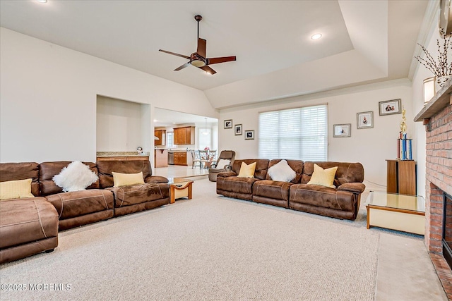 1 Christie Ln, Freehold, NJ 07728 - carpeted living room with a brick fireplace, ceiling fan, and lofted ceiling
