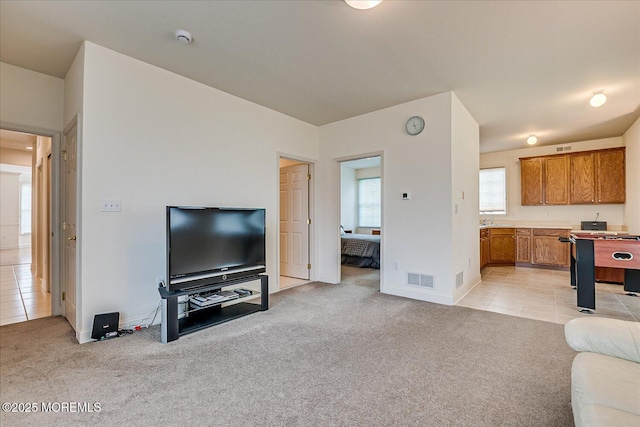 1 Christie Ln, Freehold, NJ 07728 - living room with light carpet and light tile patterned flooring