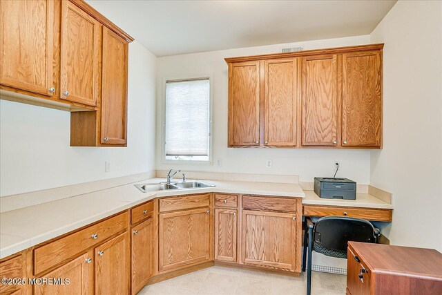 1 Christie Ln, Freehold, NJ 07728 - kitchen with light countertops, brown cabinets, and an office area