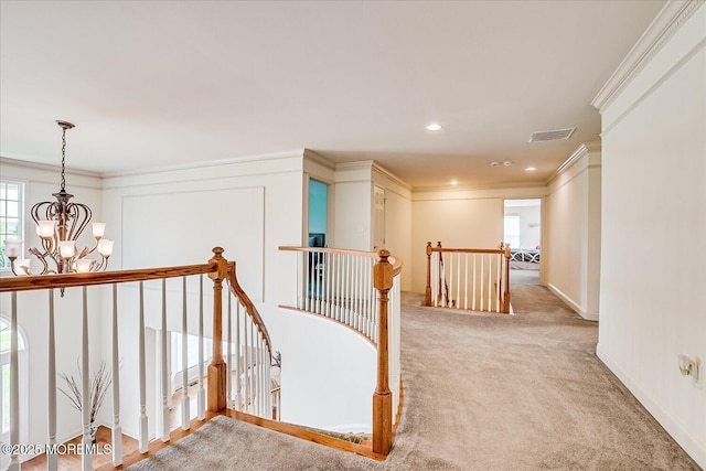 1 Christie Ln, Freehold, NJ 07728 - corridor with an upstairs landing, crown molding, a chandelier, carpet flooring, and recessed lighting