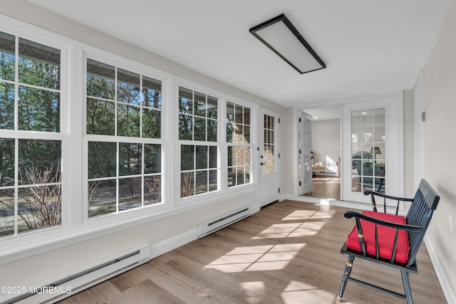 sunroom featuring baseboard heating